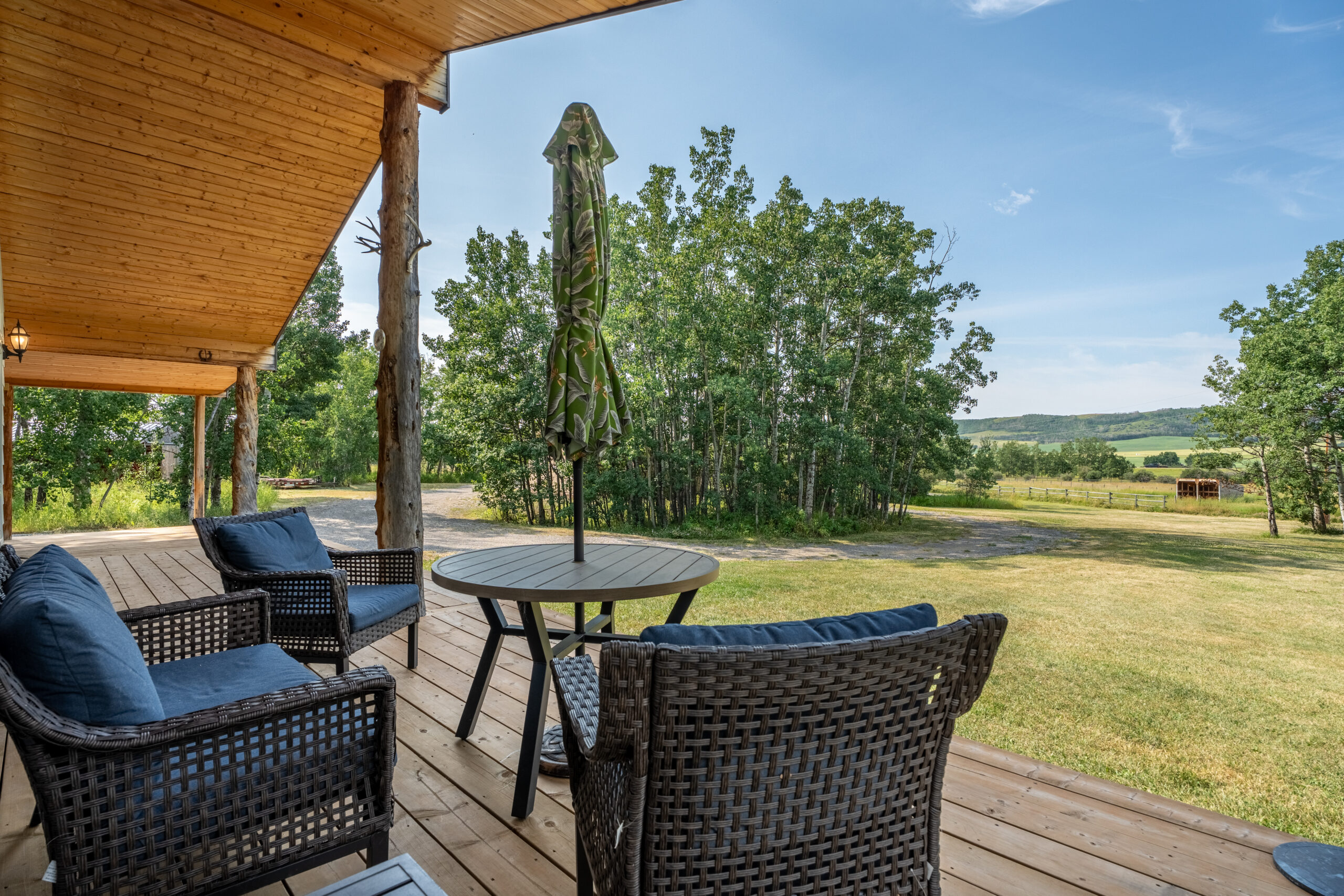 West facing deck Foothills County acreage for sale